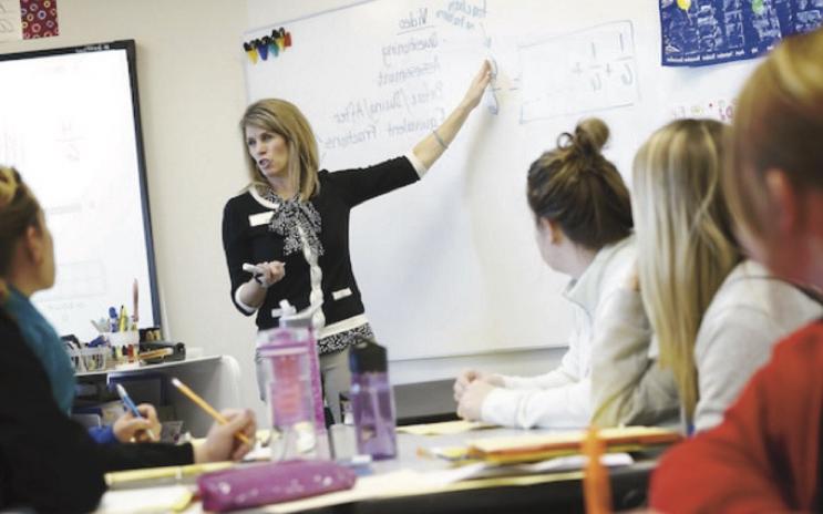 Students observe a teacher